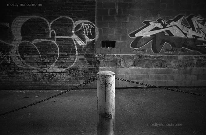 A post, a chain, some graffiti